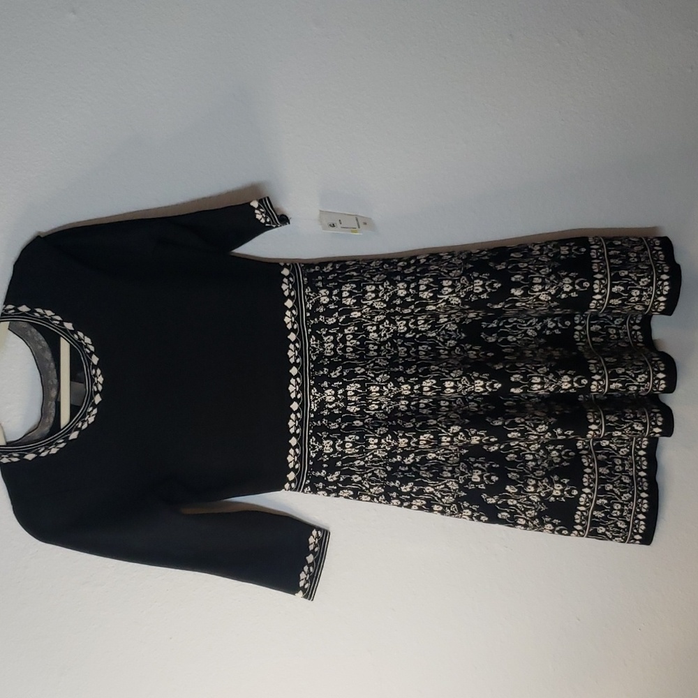 Taylor fit and flare floral sweater dress. Size medium.